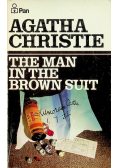 The man in the brown suit