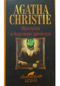 Mężczyzna w brązowym garniturze