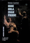 Obok Orła znak Pogoni