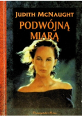 Podwójną miarą