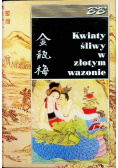 Kwiaty śliwy w złotym wazonie