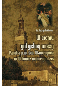 W cieniu gotyckiej wieży Parafia p.w.  św Wawrzyńca w Wołowie wczoraj i dziś