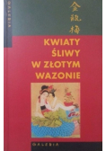 Kwiaty śliwy w złotym wazonie