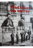 Ślad dłoni na murze