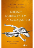 Między dobrobytem a szczęściem