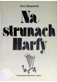 Na strunach harfy