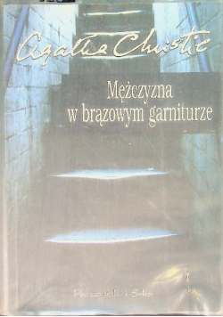 Mężczyzna w brązowym garniturze