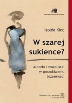 W szarej sukience