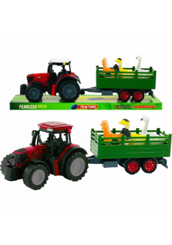 Traktor z przyczepą i ptakami