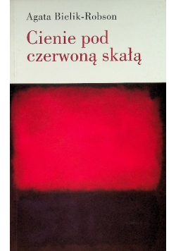 Cienie pod czerwoną skałą